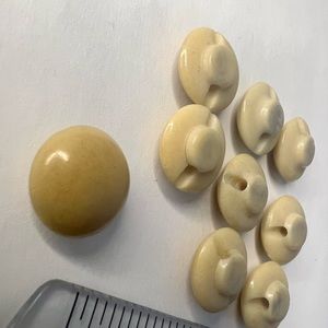 Vintage lot of 9 stone or bone buttons